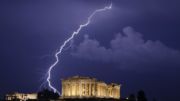 A flash of lightning illuminates the sky over the 2,500-year-old Ancient Parthenon temple, at the Acropolis hill during a heavy rainfall in Athens, early Monday, June 28, 2010.(AP Photo/Petros Giannakouris) Athens Photo World (APW)
